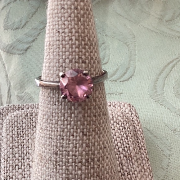 Jewelry - 925 sterling silver band with round faceted pink stone in raised cage sett
